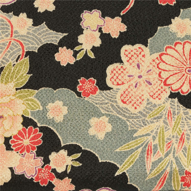 日本紐釦貿易 ちりめん 金彩 椿柄 黒 巾約70cm×1ｍ切売カット DS03-06-1M 1枚（ご注文単位1枚）【直送品】